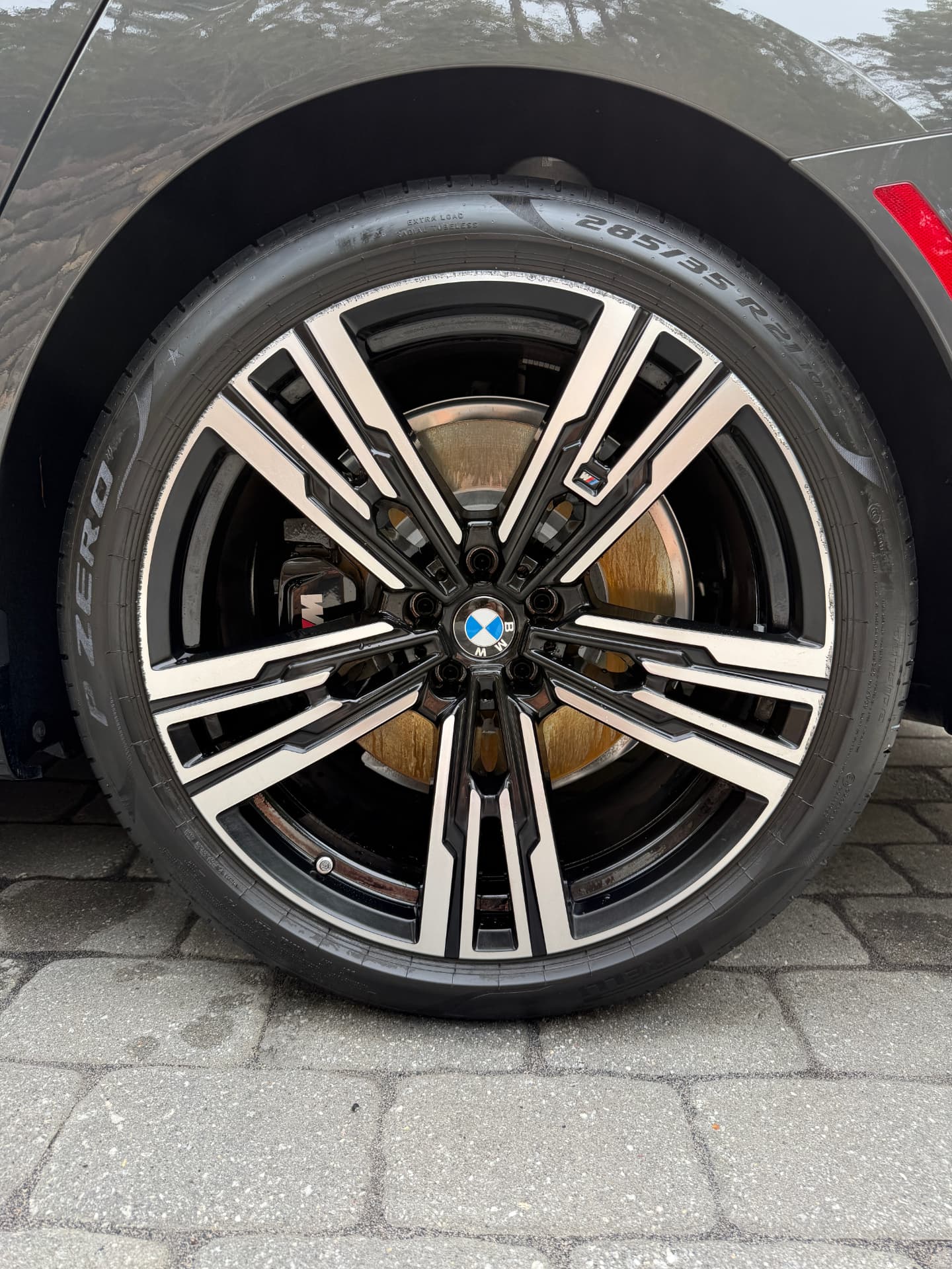 Same BMW wheel and tire after detailing, cleaned and dressed