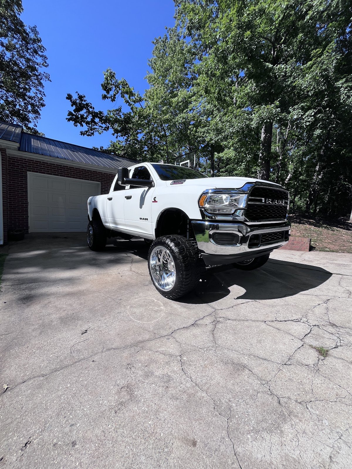 White Ram pickup with polished wheels from Allen Auto Detailing’s Google photos